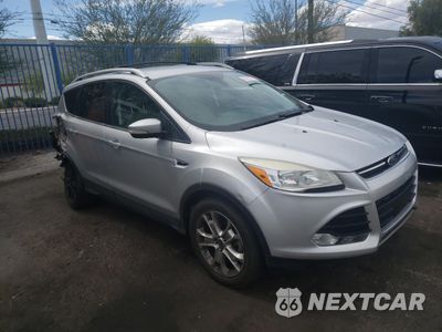 Czwarte zdjęcie samochodu z boku: 2014 FORD ESCAPE TITANIUM VIN:1FMCU0J90EUB98640 - miniatura