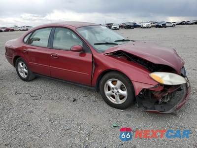 Czwarte zdjęcie samochodu z boku: 2002 FORD TAURUS SE VIN:1FAFP53UX2G133785 - miniatura
