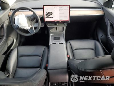 Zdjęcie 8 z 15 samochodu: 2022 TESLA MODEL Y VIN:7SAYGDEE7NF315691 - miniatura