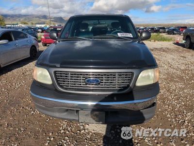 Piąte zdjęcie samochodu w środku: 2002 FORD F150 VIN:1FTRX17202NA40343 - miniatura