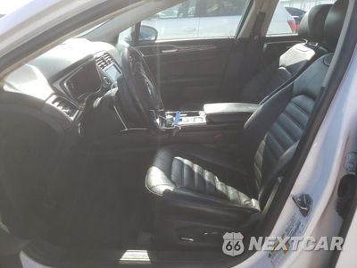 Zdjęcie 7 z 13 samochodu: 2017 FORD FUSION SE HYBRID VIN:3FA6P0LU6HR408928 - miniatura