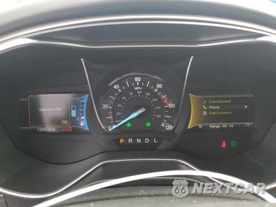 Zdjęcie 9 z 12 samochodu: 2017 FORD FUSION SE HYBRID VIN:3FA6P0LUXHR359667 - miniatura