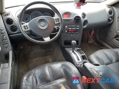 Zdjęcie 8 z 14 samochodu: 2004 PONTIAC GRAND PRIX GT2 VIN:2G2WS522741148130 - miniatura