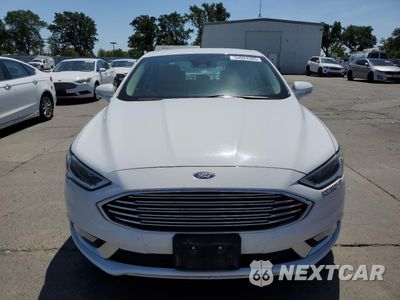 Piąte zdjęcie samochodu w środku: 2017 FORD FUSION SE HYBRID VIN:3FA6P0LU5HR409360 - miniatura
