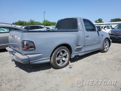 Trzecie zdjęcie samochodu z tyłu: 1999 FORD F150 VIN:2FTRF07L0XCA61650 - miniatura