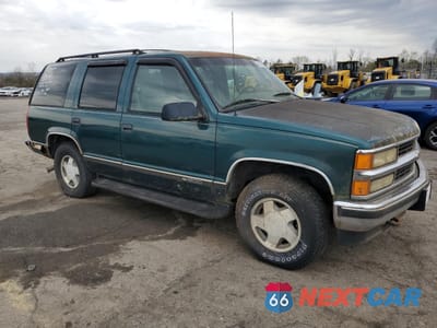 Czwarte zdjęcie samochodu z boku: 1996 CHEVROLET TAHOE K1500 VIN:1GNEK13R9TJ424167 - miniatura