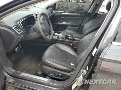 Zdjęcie 7 z 14 samochodu: 2016 FORD FUSION TITANIUM VIN:3FA6P0K98GR214431 - miniatura