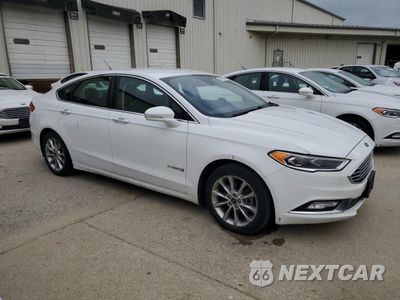 Czwarte zdjęcie samochodu z boku: 2017 FORD FUSION SE HYBRID VIN:3FA6P0LU6HR359682 - miniatura