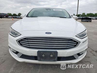 Piąte zdjęcie samochodu w środku: 2017 FORD FUSION SE HYBRID VIN:3FA6P0LU5HR408984 - miniatura