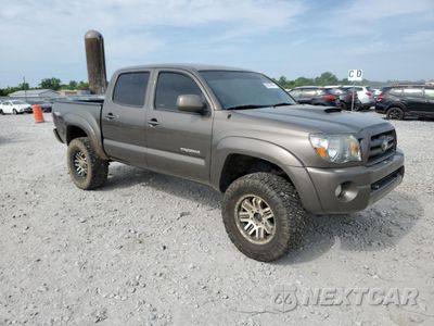 Czwarte zdjęcie samochodu z boku: 2010 TOYOTA TACOMA DOUBLE CAB VIN:3TMLU4EN1AM045072 - miniatura