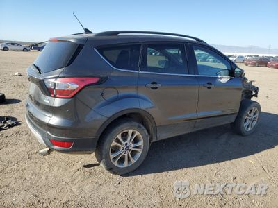 Trzecie zdjęcie samochodu z tyłu: 2018 FORD ESCAPE SE VIN:1FMCU0GD5JUD22018 - miniatura