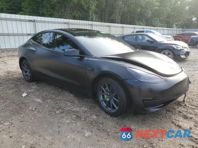 Czwarte zdjęcie samochodu z boku: 2021 TESLA MODEL 3 VIN:5YJ3E1EB1MF983177 - miniatura