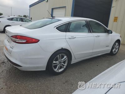 Trzecie zdjęcie samochodu z tyłu: 2018 FORD FUSION SE HYBRID VIN:3FA6P0LU7JR129963 - miniatura