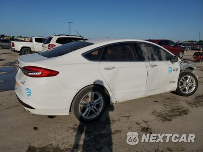 Trzecie zdjęcie samochodu z tyłu: 2018 FORD FUSION SE HYBRID VIN:3FA6P0LU7JR118641 - miniatura