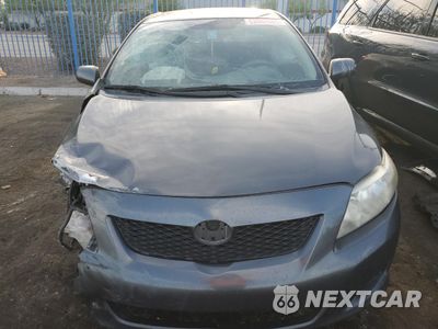 Piąte zdjęcie samochodu w środku: 2010 TOYOTA COROLLA BASE VIN:2T1BU4EE4AC512487 - miniatura