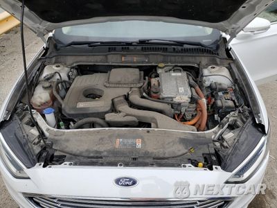 Zdjęcie 11 z 13 samochodu: 2017 FORD FUSION SE HYBRID VIN:3FA6P0LU9HR359627 - miniatura