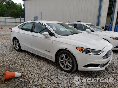 Czwarte zdjęcie samochodu z boku: 2018 FORD FUSION SE HYBRID VIN:3FA6P0LU3JR171756 - miniatura