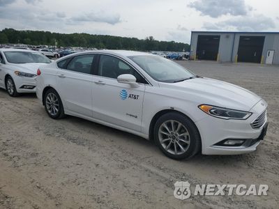 Czwarte zdjęcie samochodu z boku: 2017 FORD FUSION SE HYBRID VIN:3FA6P0LU4HR409124 - miniatura