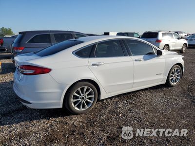 Trzecie zdjęcie samochodu z tyłu: 2017 FORD FUSION SE HYBRID VIN:3FA6P0LU7HR409604 - miniatura