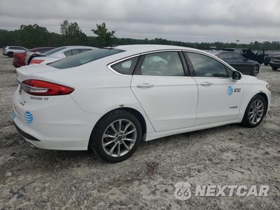 Trzecie zdjęcie samochodu z tyłu: 2017 FORD FUSION SE HYBRID VIN:3FA6P0LU1HR409615 - miniatura