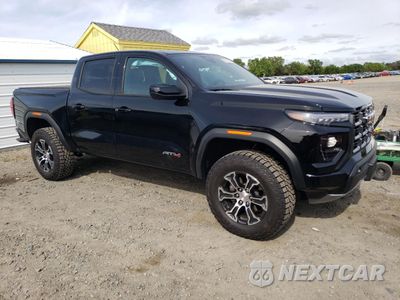 Czwarte zdjęcie samochodu z boku: 2024 GMC CANYON AT4 VIN:1GTP6DEK2R1288724 - miniatura