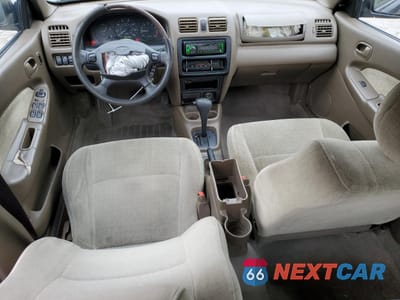 Zdjęcie 8 z 14 samochodu: 1998 MAZDA PROTEGE DX VIN:JM1BC1411W0238344 - miniatura