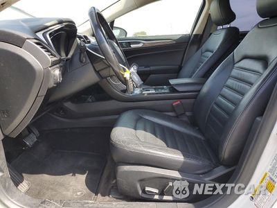 Zdjęcie 7 z 13 samochodu: 2018 FORD FUSION SE HYBRID VIN:3FA6P0LU2JR129837 - miniatura