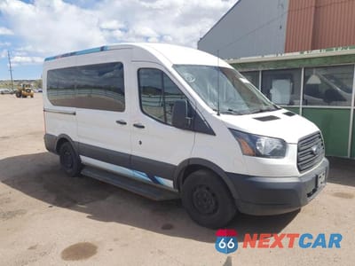 Czwarte zdjęcie samochodu z boku: 2018 FORD TRANSIT T-150 VIN:1FTYE1CM2JKB14595 - miniatura