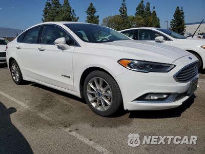 Czwarte zdjęcie samochodu z boku: 2017 FORD FUSION SE HYBRID VIN:3FA6P0LU6HR409366 - miniatura