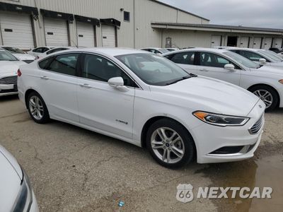 Czwarte zdjęcie samochodu z boku: 2018 FORD FUSION SE HYBRID VIN:3FA6P0LU2JR171957 - miniatura