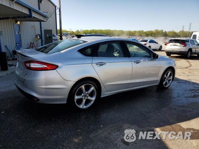 Trzecie zdjęcie samochodu z tyłu: 2016 FORD FUSION SE VIN:3FA6P0H9XGR274573 - miniatura
