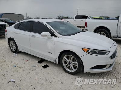 Czwarte zdjęcie samochodu z boku: 2018 FORD FUSION SE HYBRID VIN:3FA6P0LU3JR129796 - miniatura