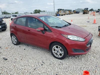 Czwarte zdjęcie samochodu z boku: 2014 FORD FIESTA SE VIN:3FADP4EJ3EM174483 - miniatura