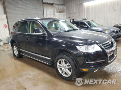 Czwarte zdjęcie samochodu z boku: 2010 VOLKSWAGEN TOUAREG V6 VIN:WVGBF7A97AD001679 - miniatura