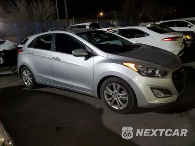 Czwarte zdjęcie samochodu z boku: 2013 HYUNDAI ELANTRA GT VIN:KMHD35LE1DU087849 - miniatura