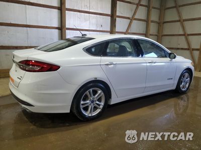 Trzecie zdjęcie samochodu z tyłu: 2018 FORD FUSION SE HYBRID VIN:3FA6P0LU8JR171719 - miniatura