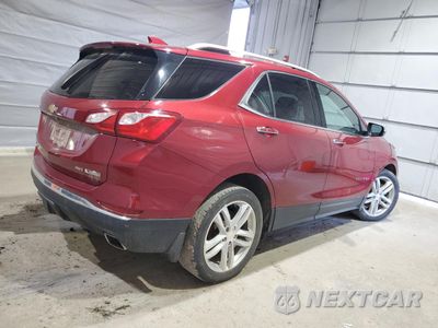 Trzecie zdjęcie samochodu z tyłu: 2018 CHEVROLET EQUINOX PREMIER VIN:2GNAXWEX7J6131452 - miniatura