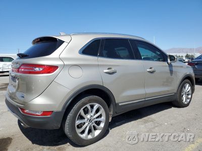Trzecie zdjęcie samochodu z tyłu: 2015 LINCOLN MKC VIN:5LMCJ1A91FUJ48164 - miniatura