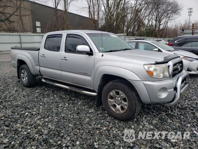 Czwarte zdjęcie samochodu z boku: 2010 TOYOTA TACOMA DOUBLE CAB LONG BED VIN:5TEMU4FN2AZ719462 - miniatura