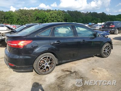 Trzecie zdjęcie samochodu z tyłu: 2016 FORD FOCUS SE VIN:1FADP3F22GL207351 - miniatura