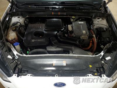 Zdjęcie 11 z 13 samochodu: 2017 FORD FUSION SE HYBRID VIN:3FA6P0LU6HR359634 - miniatura