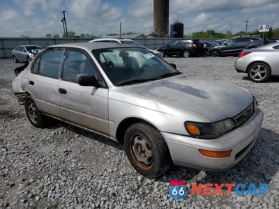 Czwarte zdjęcie samochodu z boku: 1997 TOYOTA COROLLA DX VIN:1NXBA02EXVZ538005 - miniatura