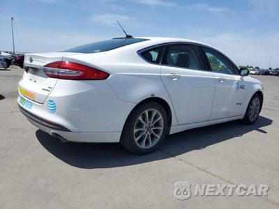 Trzecie zdjęcie samochodu z tyłu: 2017 FORD FUSION SE HYBRID VIN:3FA6P0LU0HR408892 - miniatura