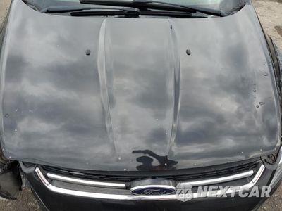 Zdjęcie 13 z 15 samochodu: 2014 FORD ESCAPE TITANIUM VIN:1FMCU9JX4EUC14440 - miniatura