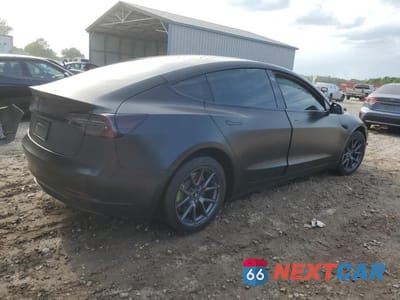 Trzecie zdjęcie samochodu z tyłu: 2021 TESLA MODEL 3 VIN:5YJ3E1EB1MF983177 - miniatura