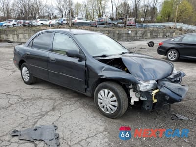 Czwarte zdjęcie samochodu z boku: 1998 MAZDA PROTEGE DX VIN:JM1BC1411W0238344 - miniatura