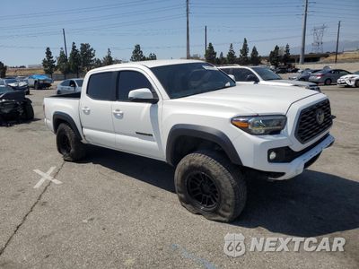 Czwarte zdjęcie samochodu z boku: 2022 TOYOTA TACOMA DOUBLE CAB VIN:3TMAZ5CN6NM163982 - miniatura