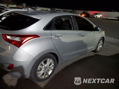 Trzecie zdjęcie samochodu z tyłu: 2013 HYUNDAI ELANTRA GT VIN:KMHD35LE1DU087849 - miniatura