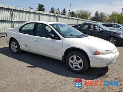 Czwarte zdjęcie samochodu z boku: 1999 DODGE STRATUS ES VIN:1B3EJ56H2XN584591 - miniatura