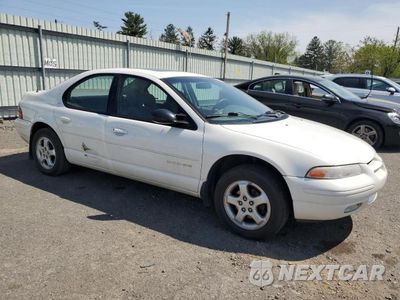 Czwarte zdjęcie samochodu z boku: 1999 DODGE STRATUS ES VIN:1B3EJ56H2XN584591 - miniatura